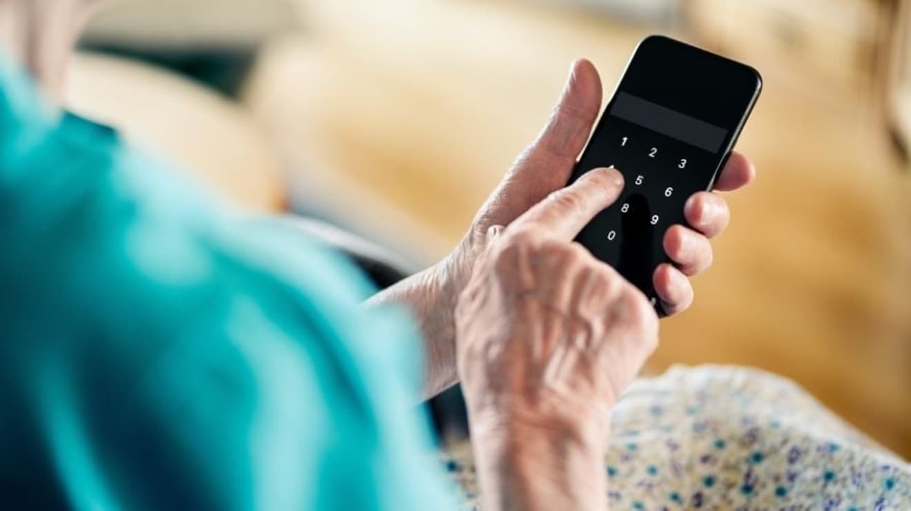 Person sat on sofa calling SES Water