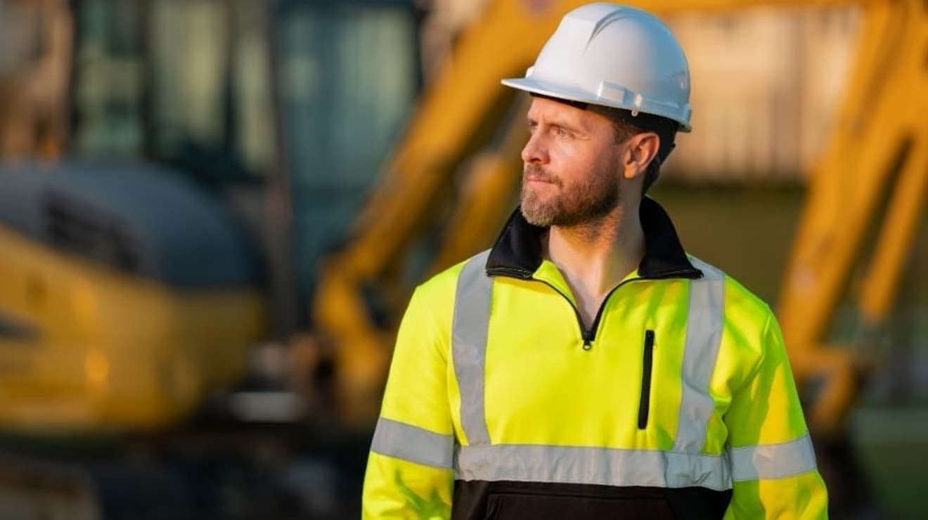 Builder on building development site