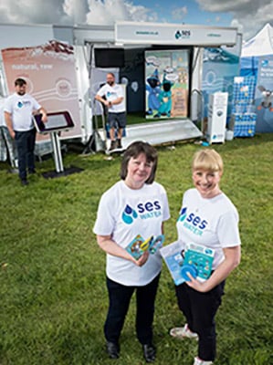 SES community team smiling for the camera at a community event